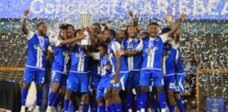 FOOTBALL-Three teams already locked in as 2026 Caribbean Cup draw date set. Caribbean Cup trophy with three team flags and calendar marking draw date