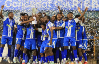FOOTBALL-Three teams already locked in as 2026 Caribbean Cup draw date set. Caribbean Cup trophy with three team flags and calendar marking draw date