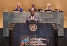 Barbados reiterates its commitment to orderly migration. Barbados foreign minister at UN podium discussing migration policies