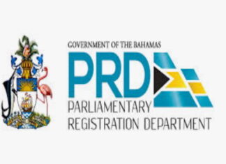 BAHAMAS-Opposition party promises fixed election date for The Bahamas. Opposition leader speaking at rally with calendar showing fixed election date