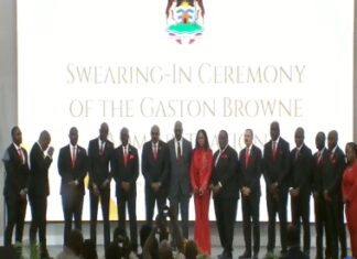 ANTIGUA-PM Browne names 11-member Cabinet. Cabinet ministers seated around table with PM Browne at head
