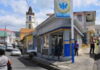 DOMINICA-Government to provide a subsidy to Dominicans to cushion the impact of the Middle East war. Dominica government official announcing energy subsidy with concerned citizens
