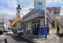 DOMINICA-Government to provide a subsidy to Dominicans to cushion the impact of the Middle East war. Dominica government official announcing energy subsidy with concerned citizens