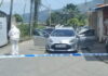 TRINIDAD-Toddler among three people murdered in broad daylight Police officers at crime scene with yellow tape in Trinidad neighborhood